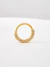 Piercing de argolinha cravejada com zircônias frontal, banhado a ouro 18K. - comprar online