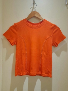 REMERA LENTE NARANJA en internet