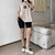 Shorts Legging cintura alta com bolso para celular - comprar online