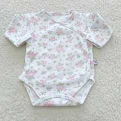 Body cruzado rosas rosas (ÚLTIMO 3-6 MESES)