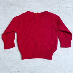 Sweater con bolsillo rojo en internet
