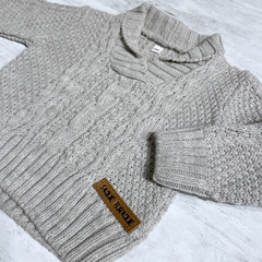 Sweater cuello smoking cemento en internet