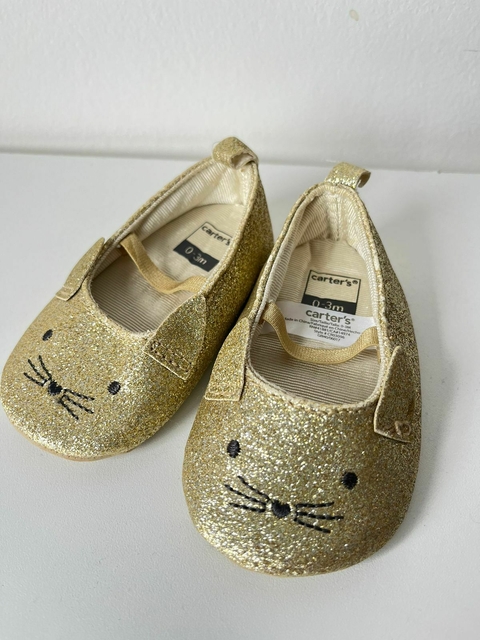 Zapatitos dorados carters 0-3m(255)