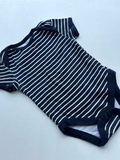 Body rayado azul primark 6-9m (150)