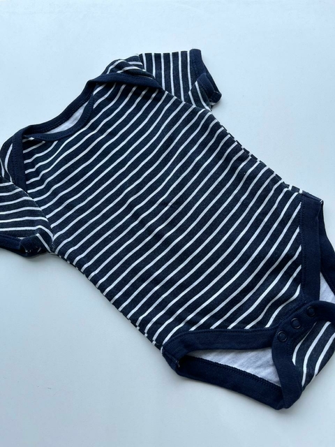Body rayado azul primark 6-9m (150)