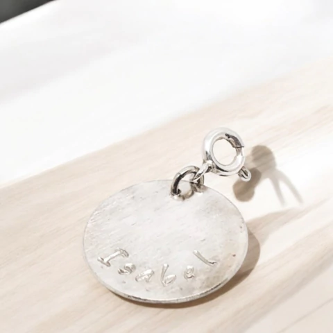 Dije circular grabado en plata - comprar online