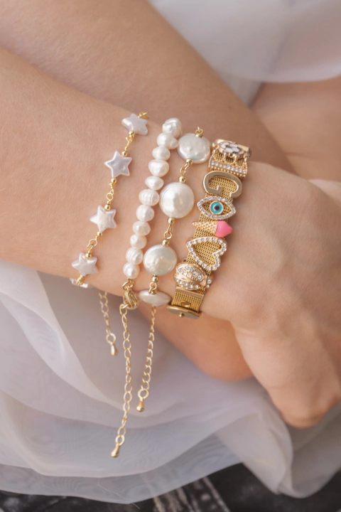 PULSERA ESTRELLITAS NACAR