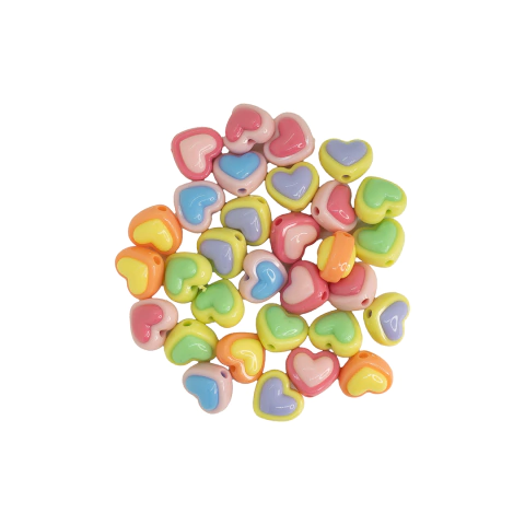 (CO-2193) PAQ. 50 GR. CORAZONES PASANTES 3D DE PLÁSTICO - 12x17 MM