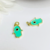 (GF-0402) DIJE MANO DE HAMSA VERDE