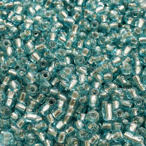(CO-1785) BOLSA 50 GR. MOSTACILLÓN 6/0 AQUA TRANSLUCIDO