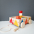 Carrito con bloques arcoiris