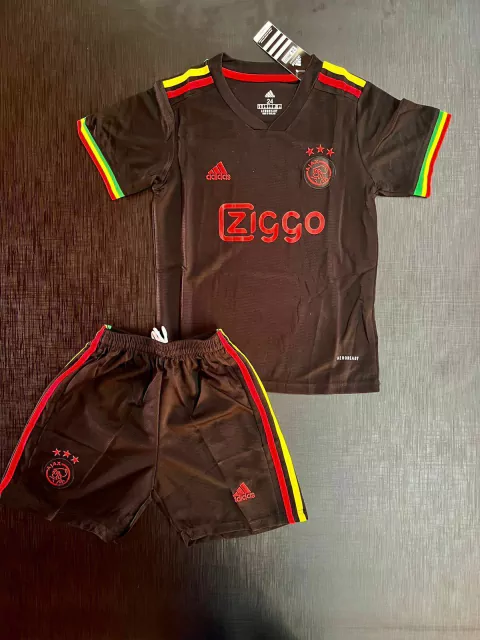 Kit Niños RETRO Ajax 2021/22 negro Versión Bob Marley