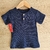 Remera de bebé color azul marino con botones 