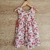 Vestido en tela poplin con flores estampadas.