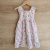 Vestido en tela poplin con estampado de flores.