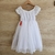 Vestido blanco en tul  con mangas cortas y detalles bordados