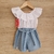 Entero de broderie y simil jean con lazo.
