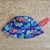 gorro piluso con estampa de animales marinos