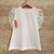 Remera con manga globo en tul.