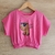 Remera pupera rosa  con dibujo de capybara