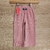 Pantalones palazzo de color rosa .