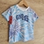 Remera batik con estampado azul y blanco  "GOOD VIBES".