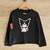 Remera negra manga larga para niñas con un estampado de Kuromi
