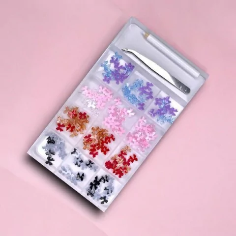 Caja de apliques moños mas accesorios