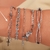 PULSEIRA PINGENTE CRUZINHAS na internet