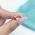 ABRIDOR MANZANA MORDIDA ESMALTADO ROJO - PL