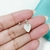 ABRIDOR CORAZON LABRADO COLGANTE TRES CUBIC - PL en internet