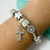 PULSERA SIMIL PANDORA CRUZ COLGANTE CUBIC BLANCO - A.BL - comprar online