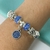 PULSERA SIMIL PANDORA CIRCULO COLGANTE CUBIC AZUL - A.BL - comprar online