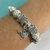 PULSERA SIMIL PANDORA CORAZON CON ALAS COLGANTE CUBIC BLANCO - A.BL - comprar online