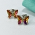 ARO PASANTE MARIPOSA CUBIC MAGENTA TORNASOLADO - AC - Agatha Chrys Joyeria