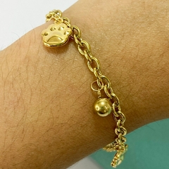 PULSERA BOLITAS Y PATITA DE PERRO - A. DR - comprar online