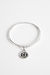 Esclava maciza con traba y dije inicial. - comprar online