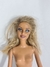 Boneca Barbie com cabelo loiro escuro e de batom roxo - comprar online