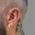 PAR DE ARGOLA CRAVEJADO COM PEDRAS DE ZIRCÔNIA MODELO NEYMAR 2 - BANHADO A OURO 18K - comprar online