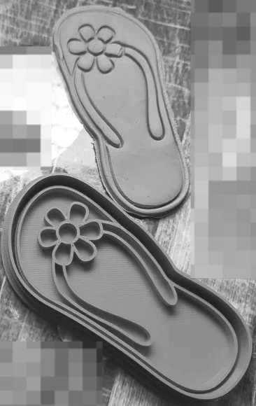 cortante ojota con flor.