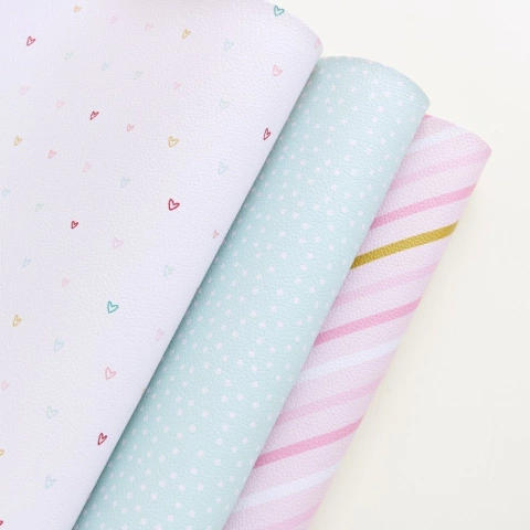 Falso cuero impreso MUERDAGO PUNTITOS CELESTE Mintopia