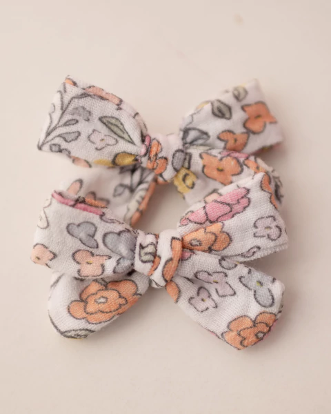 PAR DE MOÑO MINI ROSARIO ESTAMPADO FUCSIA - comprar online