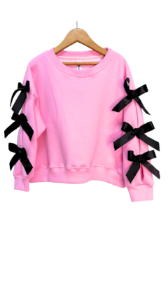 33905 Buzo Rosa Con Moños en internet