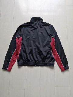 Jaqueta Puma preta GG na internet