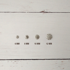 Calotas flor de 12 mm x 100 uni. - Armado Shop