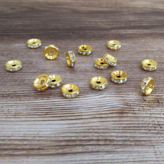 Donas con strass de 10 mm x 20 uni. DORADO