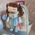 Mochila Escolar infantil 40cm com Boneca - Kit escolar fundo Creme estampada - comprar online