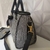 Bolsa Maternidade de Luxo Pied Poule Preto-Branco na internet