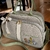 Bolsa maternidade Modelo trapézio Linho Cru com verde oliva