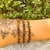 Pulseira de Olho de Tigre Lapidada 4mm - Coragem na internet